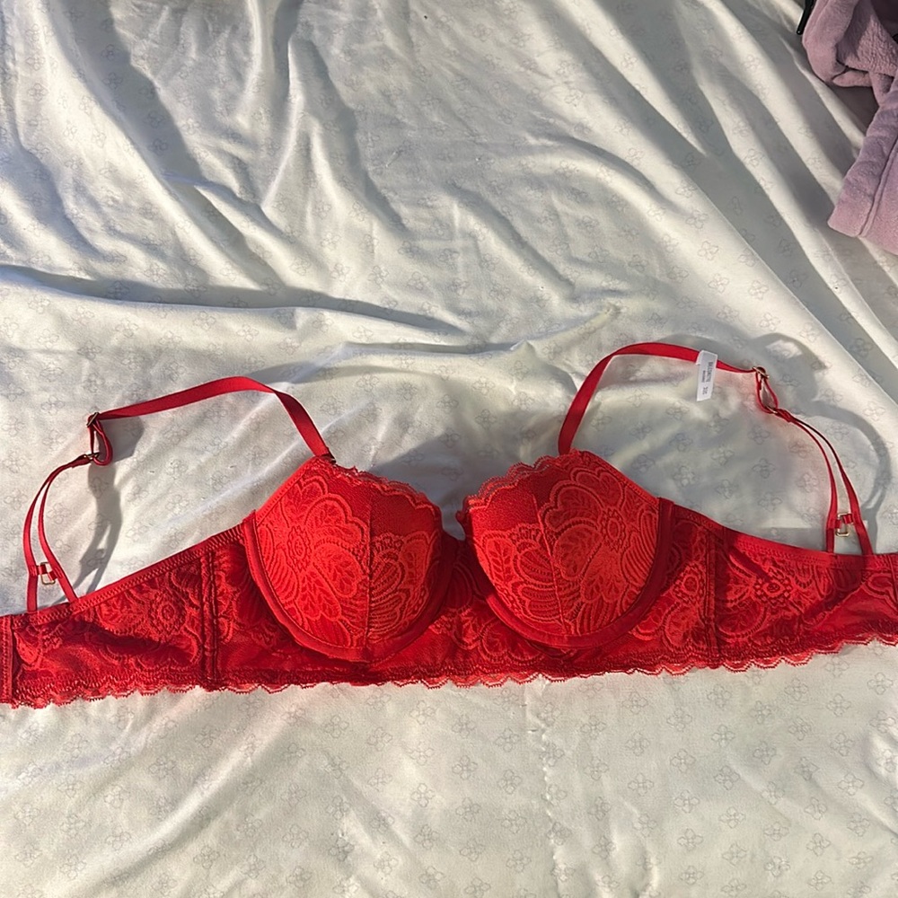red regularly padded bra. Size: 32C